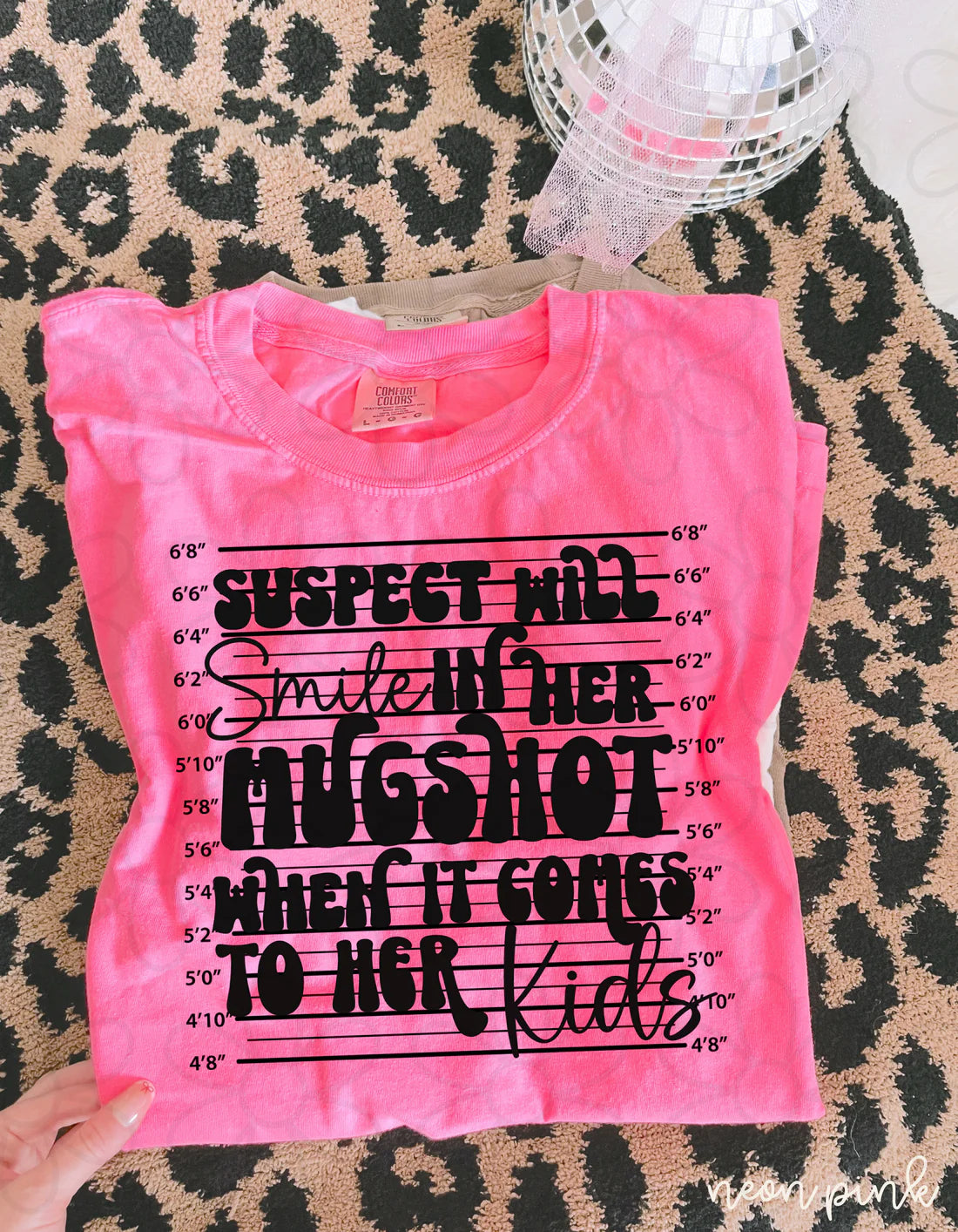 Suspect Will Smile In Her Mugshot When It Comes To Her Kids Tee